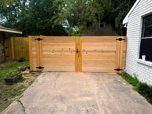 Horizontal-board cedar double driveway gate