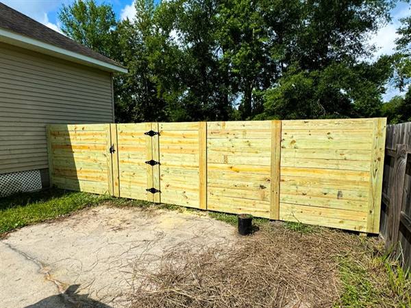 Horizontal-board treated pine fence and gate