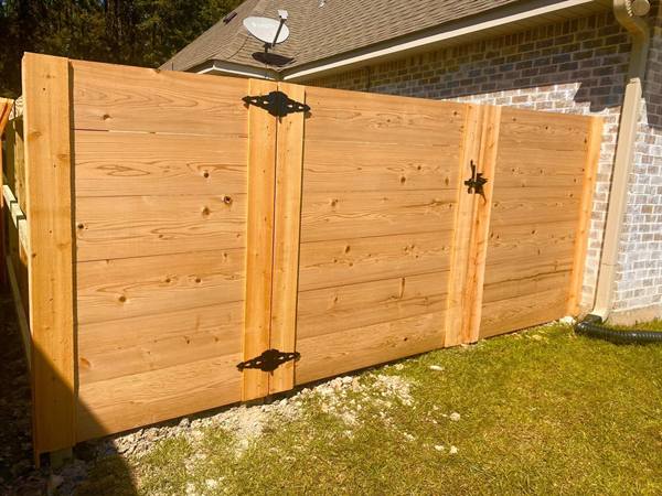 Horizontal-board cedar double gate with iron hardware