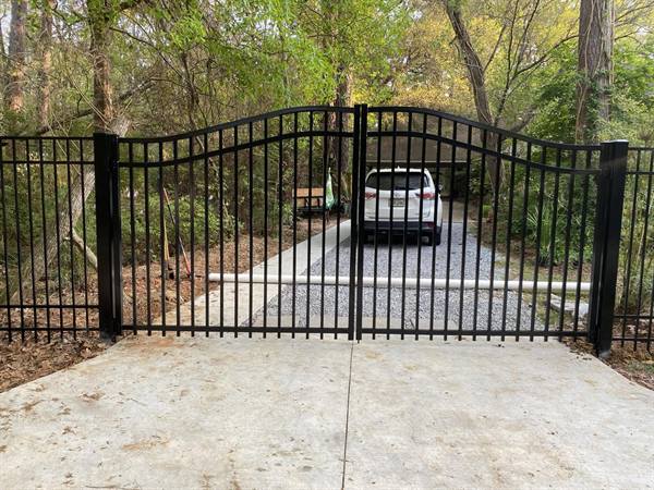 Black aluminum arched double driveway gate